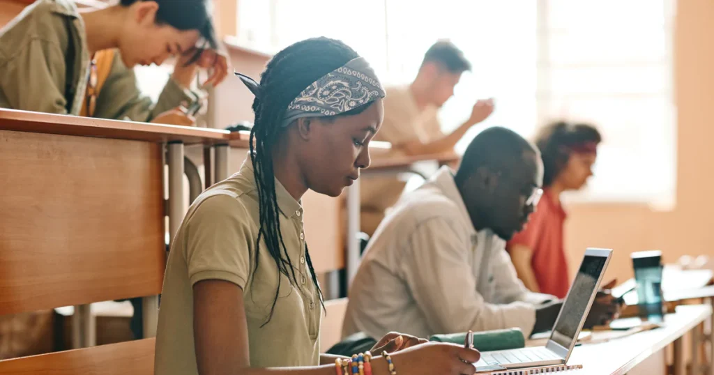 students-writing-exam-at-university